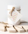 Etiquetas para regalos de bautizo iniciales flores