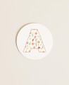 Round labels for initial baptism details, flowers, colors