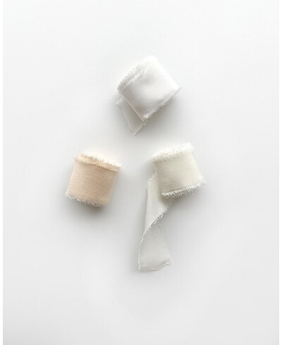 Silk ribbons in a range of white colours