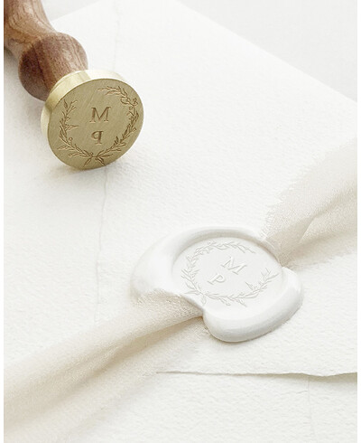 Personalized adhesive sealing seal with initials