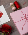 Rotes Twine-Geschenk