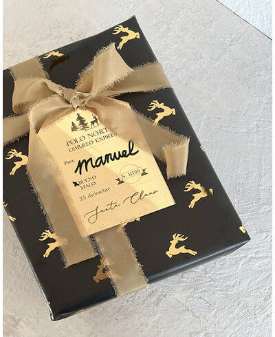 Papel de embrulho preto com rena em ouro