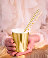 Gold and pink paper straw