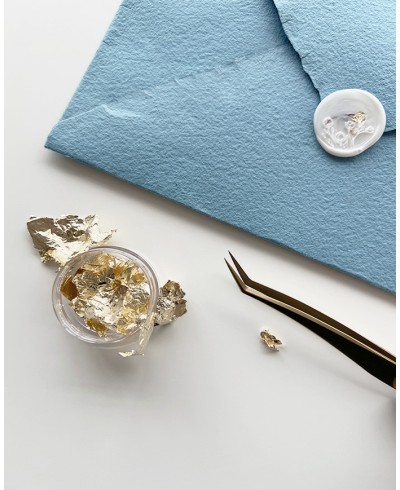 Precision tweezers in shiny gold