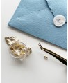 Precision tweezers in shiny gold