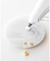 Pour the hot wax with the gun over the sealing base