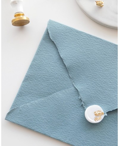 Decorated stamp on handmade envelope