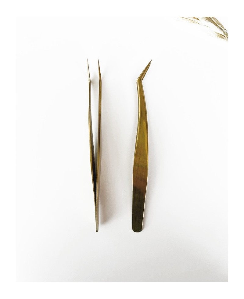 Thin golden tongs Thin golden tongs