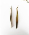 Thin golden tongs